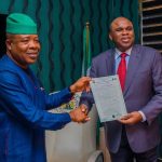 Rt. Hon Emeka Ihedioha(Left) presenting Certificate of Occupancy for the site of African Quality Assurance Centre (AQAC) in Ngor Okpala to the President of Afrexim Bank, Prof. Benedict Oramah, January 6, 2020